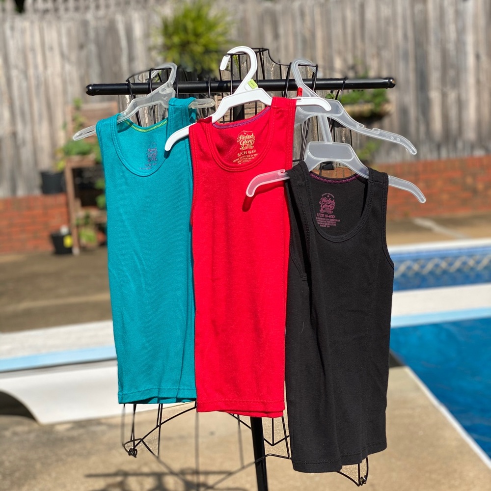 4 for $20 girls tanks: red, turquoise, black. 6/6X